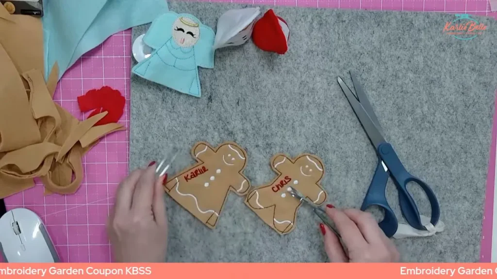Finished gingerbread man and woman with personalized names on them using Embrilliance Essentials and BX fonts.